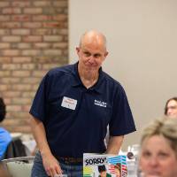 person standing at table